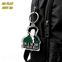 Porte-clés en acrylique Bella Quote « Skin of a Killer » avec silhouette, veste verte et texte gras – Accessoire fantaisie pour clés et sacs