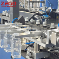 Machine de soufflage de bouteilles PET entièrement automatique à 4 cavités, machine de moulage par étirage-soufflage haute vitesse pour bouteilles en plastique d'eau minérale