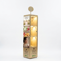 Présentoir de parfum de luxe sur pied avec éclairage LED et logo rétroéclairé personnalisé pour magasin de cosmétiques