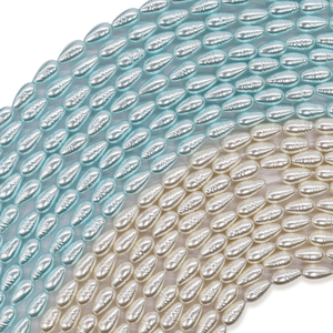 Cuentas de vidrio premium con núcleo pesado, forma Petite Marquise, color Azul Glaciar y Blanco Marfil, con textura de hilo, para DIY estilo Mermaidcore - Product Image 4