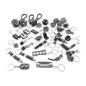 Porte-clés de voiture en métal, design turbine, moyeu de roue, disque de frein, amortisseur, volant – Idéal comme cadeau - Product Image 1