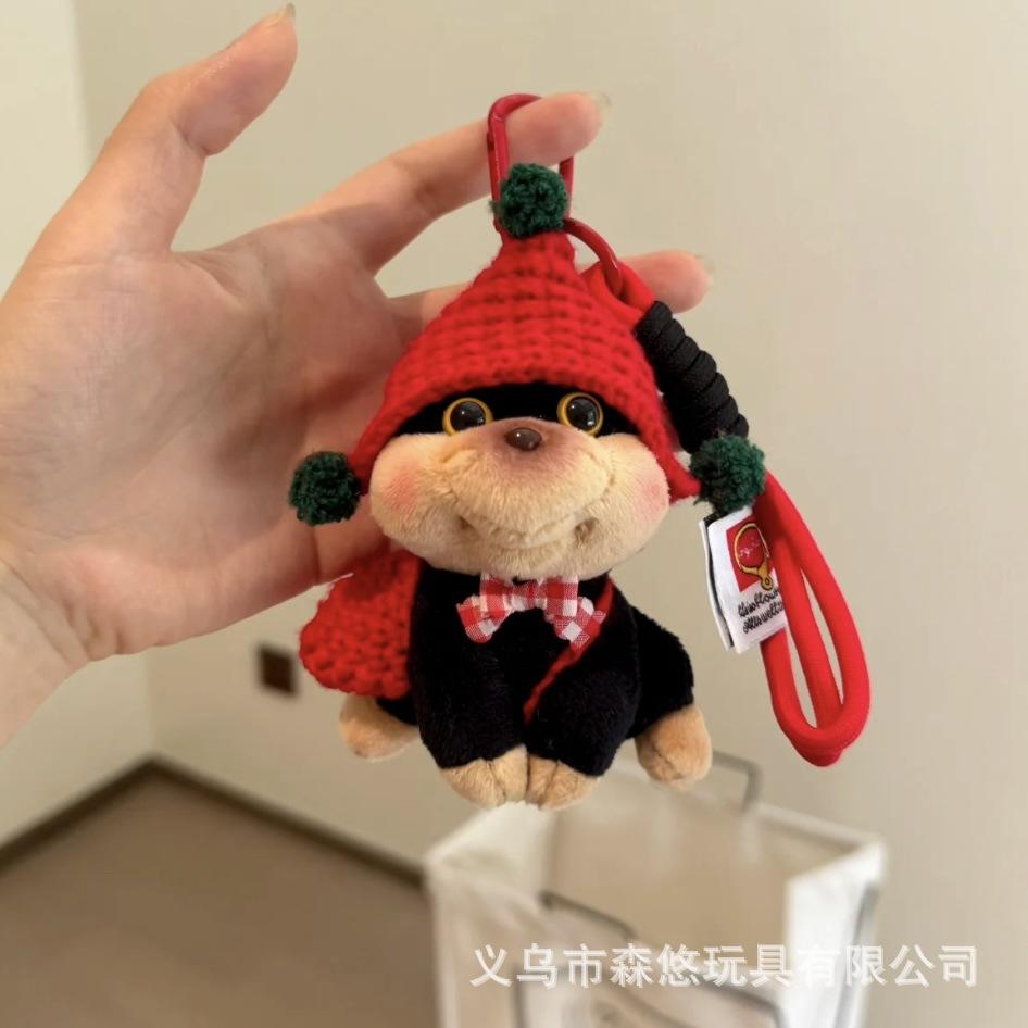 Coiffe rouge chiot assis [corde à la main]