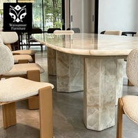 Table à manger rectangulaire moderne avec bords arrondis pour intérieurs haut de gamme, table à manger de luxe en marbre et acier inoxydable