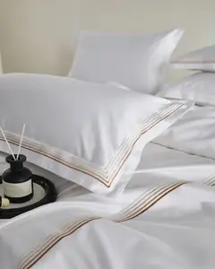 Conjunto de lençóis de hotel com bordado em algodão branco 100 para cama de hotel, capa de cama de hotel com tamanho personalizado