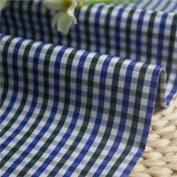 Tissu de chemise à carreaux respirant en coton longues fibres 100% 70S teint en fil, finition à l'ammoniaque liquide, toucher doux, vente en gros