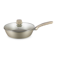 Batterie de cuisine 9 pièces au design moderne avec revêtement antiadhésif en titane Batterie de cuisine en acier au carbone de calibre lourd avec poignée douce au toucher personnalisable