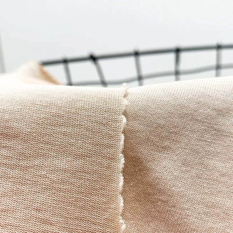 Hafif 140 Gsm 100% pamuklu süprem T gömlek kumaşı imalatı için katı örme organik pamuk bambu kumaş T Shirt