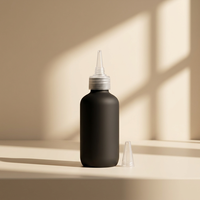 Bouteille souple personnalisée en LDPE noir de 120 ml (4 oz) avec col 24/410, finition mate ou brillante, avec bouchon applicateur pour huile capillaire et coloration