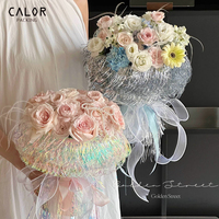 Papier d'emballage décoratif style Chanel avec pompon méduse holographique fluide pour sacs et fleurs