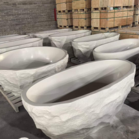 Baignoire autoportante Weihao en surface solide, courbée, texture travertin, baignoire en pierre artificielle pour salle de bain