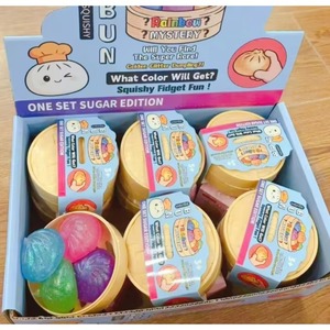Peluche Antiestrés Lavable y Reutilizable con Forma de Bollo al Vapor Arcoíris, Caja Sorpresa con Forma de Comida, Carcasa de TPR Ecológica con Purpurina, para Niñas - Product Image 1