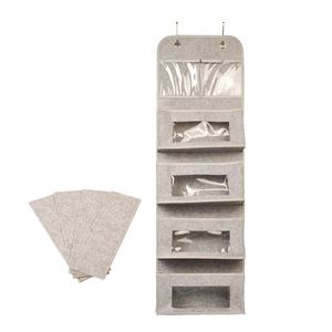 กระเป๋าจัดระเบียบแบบแขวนประตูมีของจำนวนมาก - Product Image 2