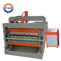 Machine de formage à rouleaux pour la fabrication de tôles trapézoïdales et de tôles ondulées à double couche