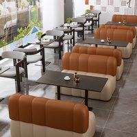 Conjunto de Sofás Modulares Acolchados con Mesa de Mármol Blanco y Base de Metal Negro para Cafetería, Salón o Área de Descanso