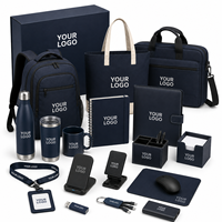 Ensemble cadeau promotionnel personnalisé avec polo, sac à dos, gobelet, carnet et accessoires pour les cadeaux d'entreprise, les campagnes de distribution