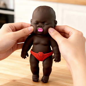 Poupée noire à rebond lent en TPR, mignonne et douce, jouet extensible et moelleux pour bébé, idéal comme cadeau - Vente chaude promotionnelle - Product Image 1