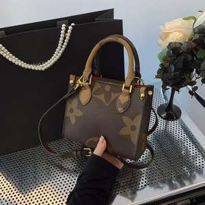 Sacs fourre-tout de luxe unisexe en cuir véritable Louis Version 2025 avec fermeture éclair, deux poignées, pliables, forme oreiller de voyage - Product Image 4