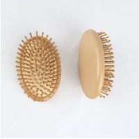 Peigne de massage en bois de hêtre à marque privée avec masseur de cuir chevelu, brosse à cheveux ovale portable à coussin d'air avec aiguilles en bambou et acier, mini-airbag