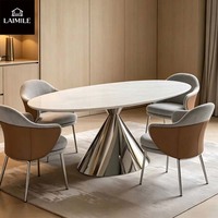 Table à manger ovale en marbre de luxe moderne avec une base en métal chromé poli, adaptée aux villas, aux maisons, aux hôtels, aux restaurants