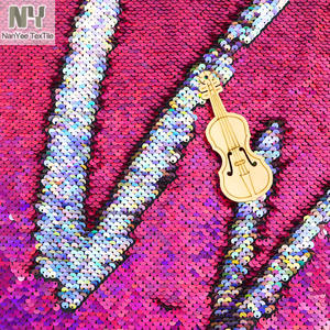 Nanyee Textile Stock suministrado tela <span class=keywords><strong>de</strong></span> lentejuelas <span class=keywords><strong>de</strong></span> sirena <span class=keywords><strong>de</strong></span> <span class=keywords><strong>dos</strong></span> caras para decoración <span class=keywords><strong>de</strong></span> paredes venta por metro - Product Image 1