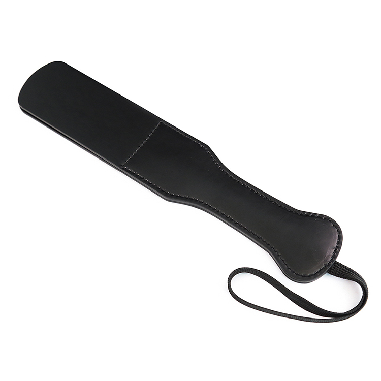 Pagaie en cuir robuste Dream Toys pour le BDSM
