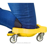 Chariot à genouillères multifonctionnel avec roues universelles et genouillères en silicone souple pour les carreleurs, utilisé dans les travaux d'installation de carrelage