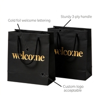 Sacs cadeaux en papier noir premium FB23 avec gaufrage doré « Bienvenue » pour les cadeaux de fête et les cadeaux d'événements