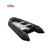 Bateau en caoutchouc à coque rigide, bateau gonflable de sauvetage de couleur noire avec plancher en aluminium