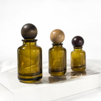 Pompe de pulvérisation vide en gros 30ml 50ml 100ml cylindre rond emballage cosmétique huile essentielle brun bouteille de parfum de luxe