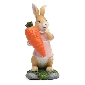 イースター樹脂工芸品ウサギ保持卵像デスクトップリビングルーム装飾ウサギ保持大根