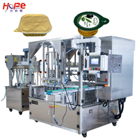 Machine de scellage thermique rotative automatique à quatre têtes pour gobelets en plastique, bouteilles en verre et emballages en film pour boissons