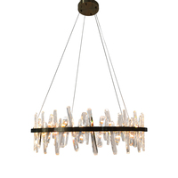 Grand lustre circulaire en cristal avec source LED dimmable et cadre en laiton brossé pour espaces résidentiels