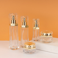 Design de mode 50g 50ml 100ml 120ml Bouteille et pot hexagonaux en verre transparent en or rose pour emballage cosmétique Bouteille en verre