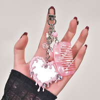 Nouveauté : Mini-breloque papillon moderne en alliage miroir fluide pour téléphone, sac, porte-clés, décoration, sangle de téléphone mignonne en forme de papillon