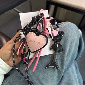 سلسلة تعليقات كورية أنيقة من سلسلة كيوت ميو، بتصميم عصري للبنات والأولاد، مناسبة للحقائب والهواتف والمفاتيح والمحافظ وإكسسوارات حقائب اليد. - Product Image 1
