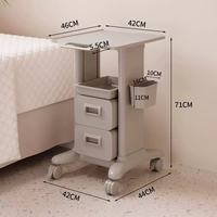 Chariot de spa professionnel en ABS durable avec tiroirs, base stable et roues pivotantes fluides pour clinique et salon