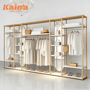 Support d'affichage <span class=keywords><strong>doré</strong></span> pour magasin de vêtements, porte-vêtements en acier inoxydable, boutique de vêtements pour femmes, présentoirs de vêtements, design de boutique de vêtements - Product Image 1