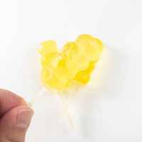 Sucettes aromatisées aux fruits en gros, emballage individuel transparent, bonbons durs, collation pour enfants