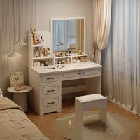 Coiffeuse blanche moderne avec miroir et éclairage, ensemble tabouret rembourré, table de maquillage pour chambre à coucher