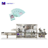 Équipement de conditionnement : Machine de cartonnage pour cosmétiques, nail art et mascara, avec plateau, pour boîtes pliantes en carton