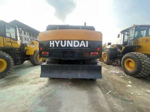 Excavatrice sur pneus Hyundai 150W-9 d'occasion, faible nombre d'heures de fonctionnement, 15 tonnes, provenance Corée, avec coupleur rapide et brise-roche, certifiée CE - Product Image 3