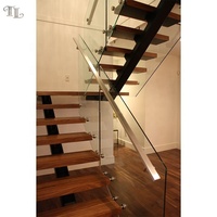 Escalier central moderne Tanlong en bois avec garde-corps en verre sans cadre, escalier industriel à marches ouvertes sur mesure