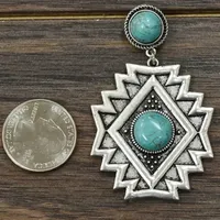 Pierres turquoises et métal estampé à la main boucles d'oreilles inspirées aztèques pour femmes petite conception de balancent aztèque occidentale pour cadeau