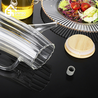 Bouteille d'huile en verre borosilicate transparent de 800 ml avec bec verseur anti-goutte, design rayé, logo OEM, fabriquée en Chine