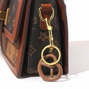 Creative Biscuit Metal Keychain High Quality Hot Selling Pendants Car Metal Keychain Women <b>Bag</b> Charms Wholesale - Product Image 2