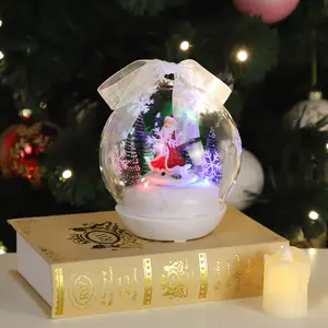 휴일 선물 도매를 위한 자전 기초를 가진 장식적인 크리스마스 불어진 유리제 나무 테이블 뮤지컬 공 구체를 120 mm 불이 켜지십시오