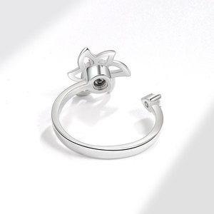 Anillos ajustables sencillos con diseño floral, anillos giratorios antiestrés con circonitas pavé, chapados en oro blanco sobre cobre, joyería para aliviar el estrés para mujer - Product Image 4