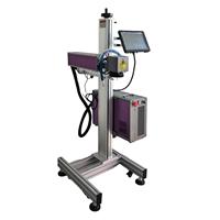 Codeur laser industriel volant, machine de marquage laser en ligne pour l'impression de codes de lots, numéros de série et dates sur les emballages