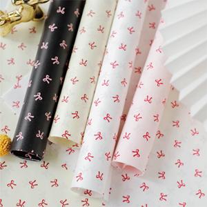 กระดาษห่อของขวัญลายโบว์หรูหรา 38GSM ขนาด 50*70 ซม. สำหรับร้านขายดอกไม้ - Product Image 1