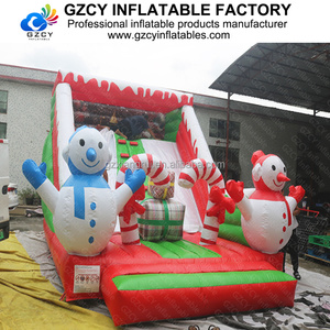 Château gonflable commercial de Noël sur le thème du bonhomme de neige, avec décoration de cannes en sucre, idéal pour la <span class=keywords><strong>location</strong></span> événementielle et les fêtes. - Product Image 2